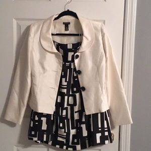 Cream and black business suit